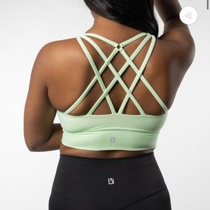 SOLD NWT Buffbunny revolution sports bra M